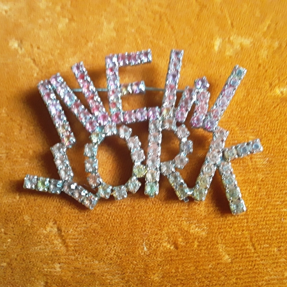 New York rhinstone brooch.